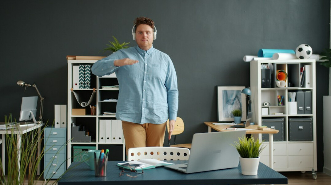 employees in office doing stretching