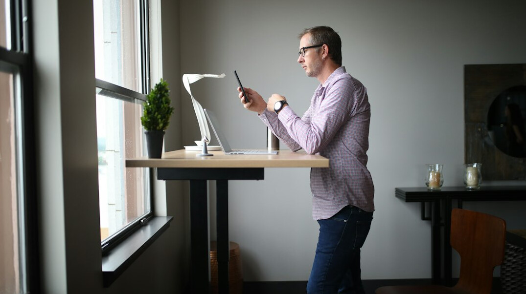 person using standing desk