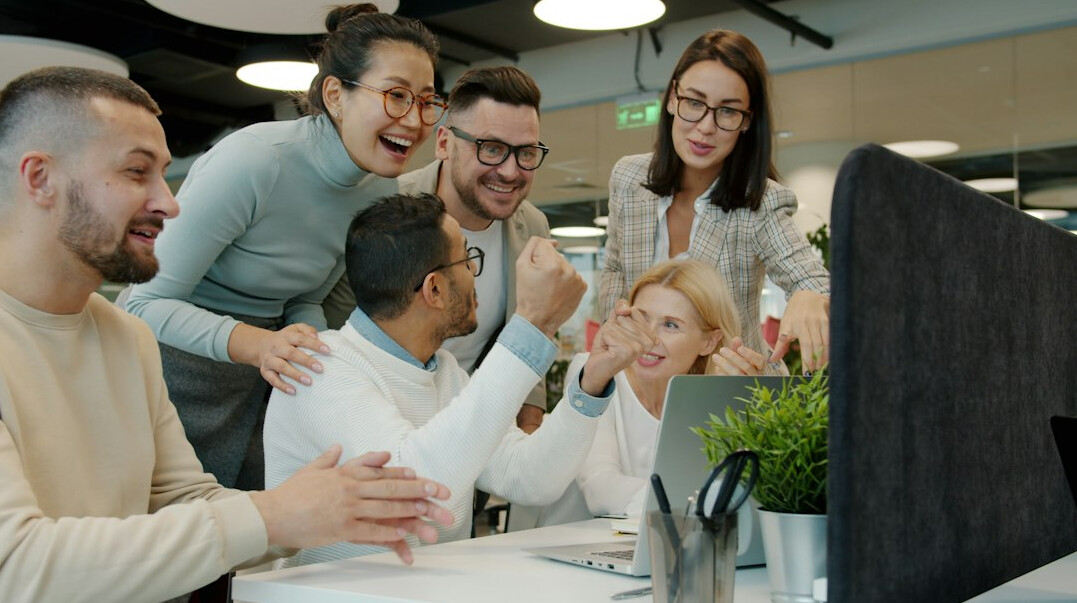 happy employees in modern office