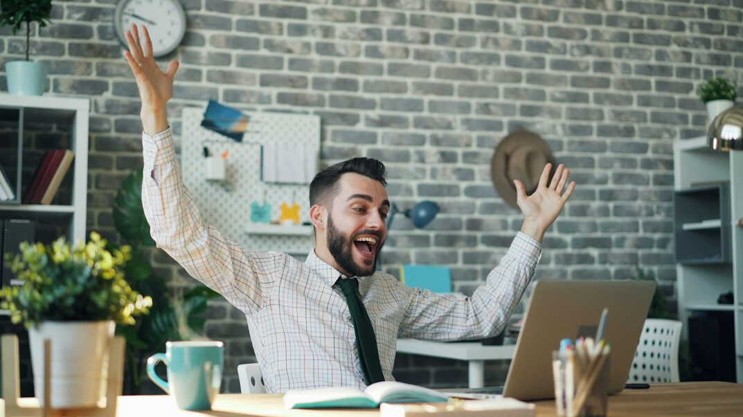 office workers stretching at desks